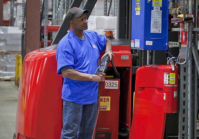 Raymond 9000 Series Swing Reach Trucks Charging